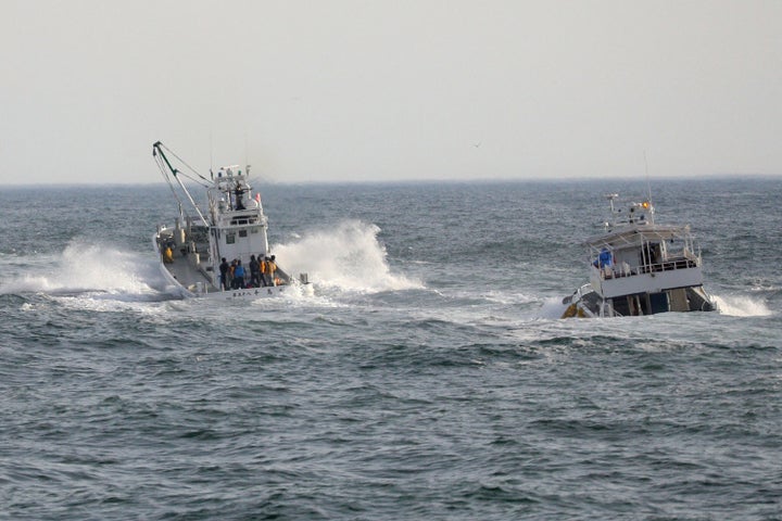 Fishing boats conduct a search operation for missing people aboard the "Kazu 1" sightseeing boat that went missing a day earlier in the Sea of Okhotsk near Shari in Japan.