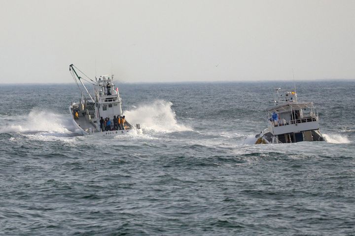 Fishing boats conduct a search operation for missing people aboard the "Kazu 1" sightseeing boat that went missing a day earlier in the Sea of Okhotsk near Shari in Japan.