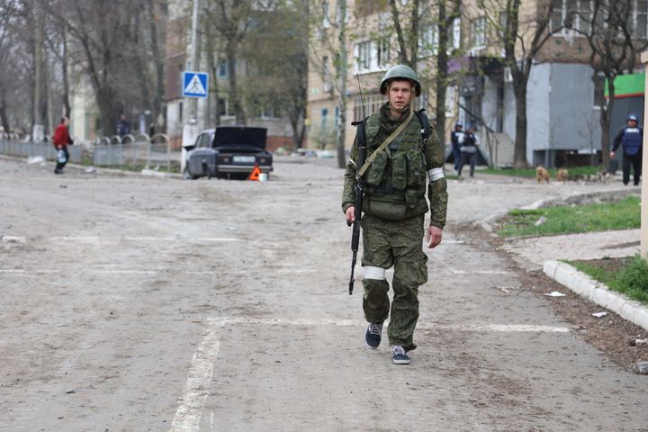 Russian military members patrol in the Ukrainian city of Mariupol under the control of Russian military and pro-Russian separatists, on April 19, 2022.