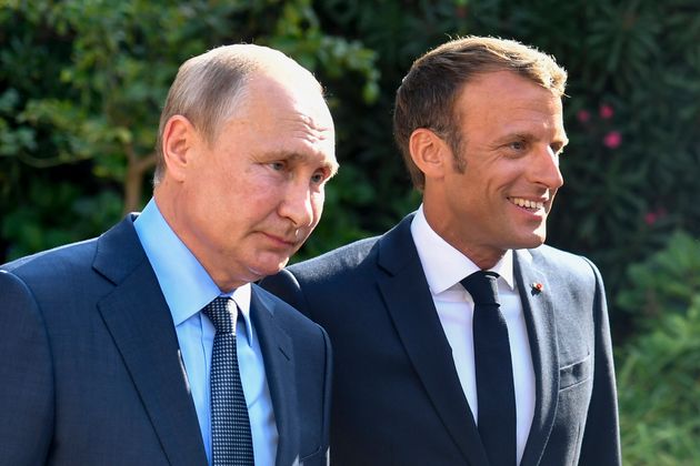 Vladimir Poutine et Emmanuel Macron, réélu président le 24 avril 2022, ici en