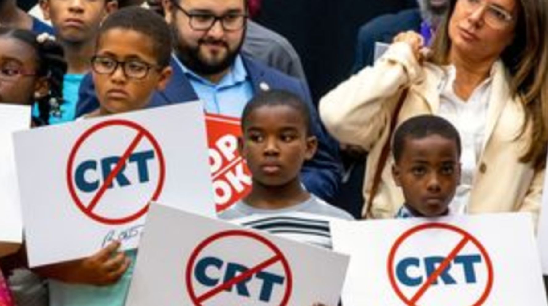 Joy Reid Calls Pic Of Black Boys Holding Anti-CRT Signs For DeSantis ‘Child Abuse’