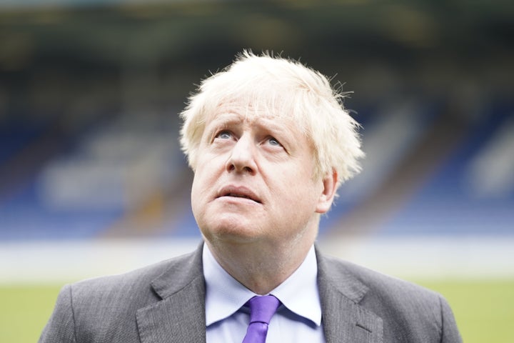 Boris Johnson during a visit to Bury FC at their ground in Gigg Lane, Bury.