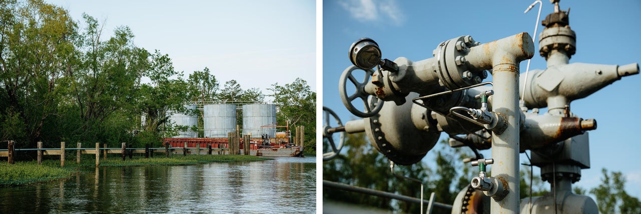 An oil well, pipelines and storage tanks sit in the middle of the swamp.