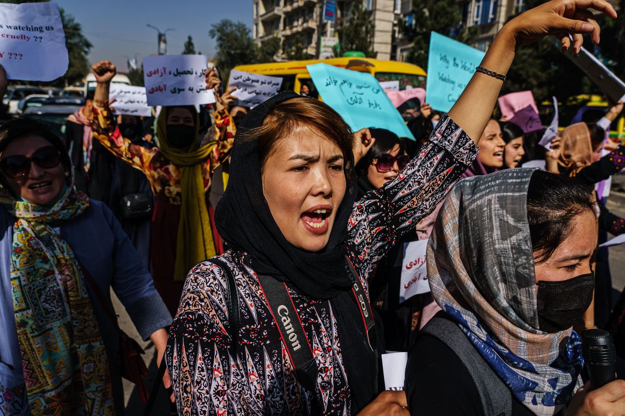Female protesters march through the Dashti-E-Barchi neighborhood in Kabul, Sept. 8.