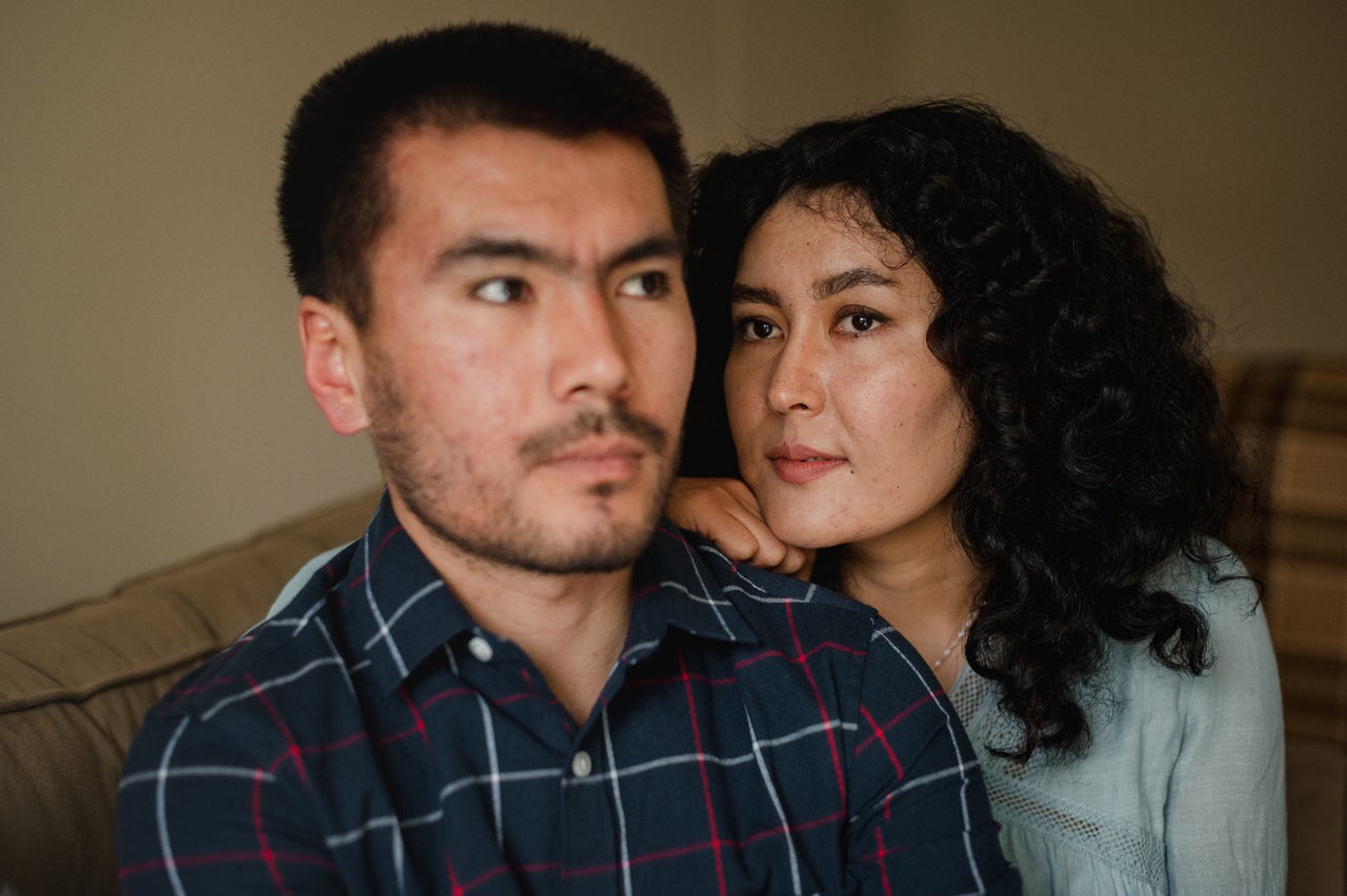 Naqdi sits with his wife, Sabera Saba, for a portrait at their home in Bethlehem on April 23. The two got married in August.