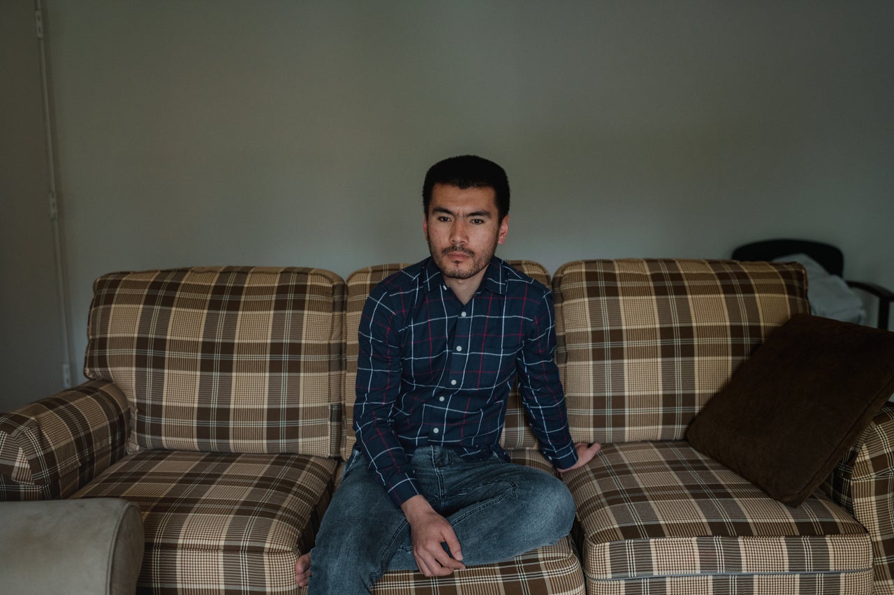 Naqdi sits for a portrait at his home in Bethlehem.