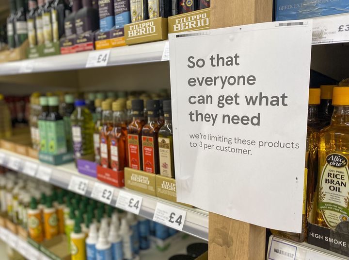 Cooking oil on shelves in a Tesco store in Ashford, Surrey