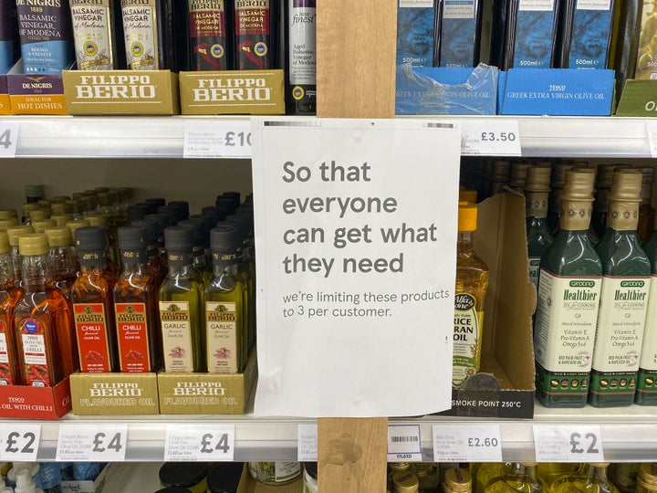 Cooking oil on shelves in a Tesco store in Ashford, Surrey. Supermarkets across the UK have placed limits on how much cooking oil customers can buy due to supply-chain problems caused by Russia's invasion of Ukraine. 