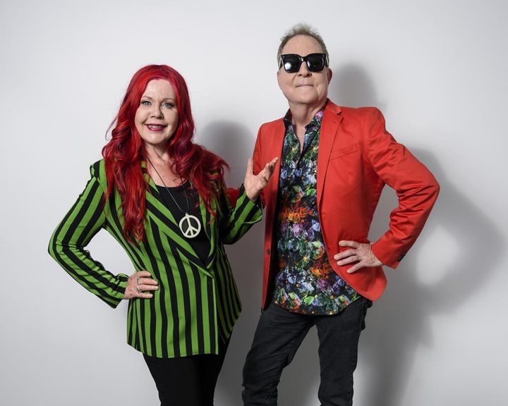 FILE - Kate Pierson, left, and Fred Schneider, of The B-52s, pose for a portrait in New York on June 21, 2018. 
