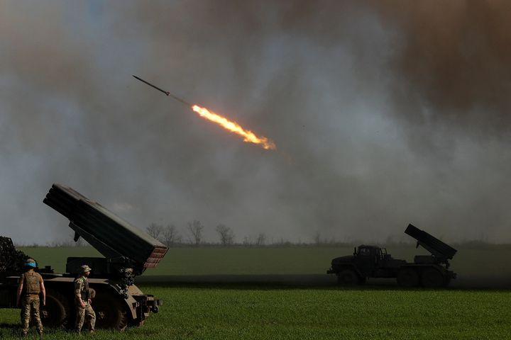 Ukrainian servicemen fire with a BM-21 Grad multiple rocket launch system, as Russia's attack on Ukraine continues, in Luhansk Region, Ukraine April 26, 2022. REUTERS/Serhii Nuzhnenko