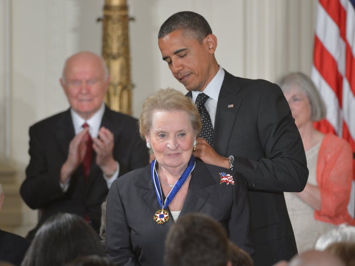 U.S. President Barack Obama presents the Presidential Medal of Freedom to former Secretary of State Madeleine Albright during a ceremony on May 29, 2012, in the East Room of the White House in Washington, D.C.