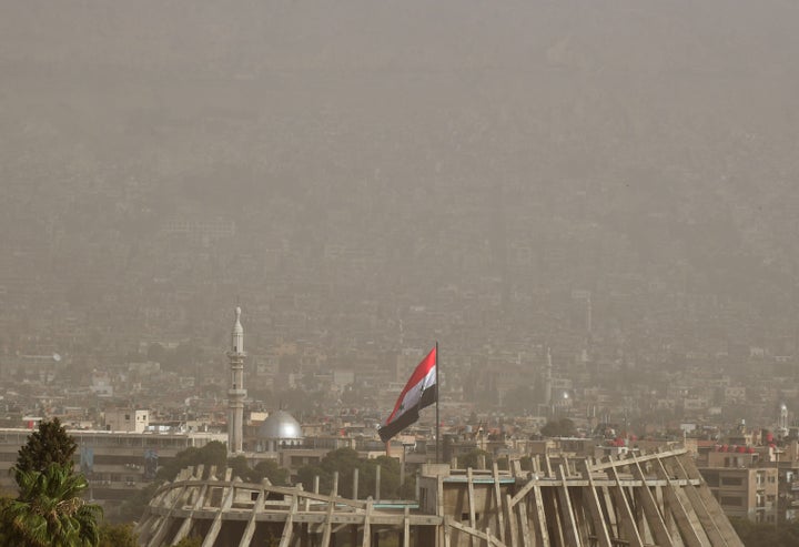 Buildings are shrouded by sand storm in Damascus, Syria on April 24, 2022. (Photo by Ammar Safarjalani/Xinhua via Getty Images)