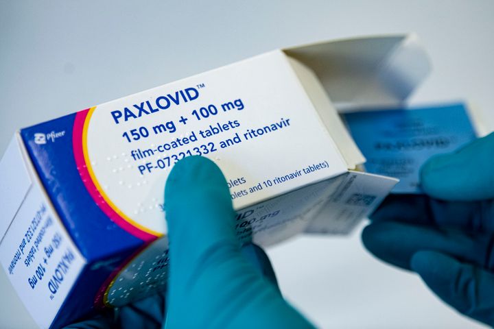 A person holds the drug Paxlovid from the U.S. pharmaceutical company Pfizer against COVID-19, in Berlin, Germany, on March 1, 2022. 