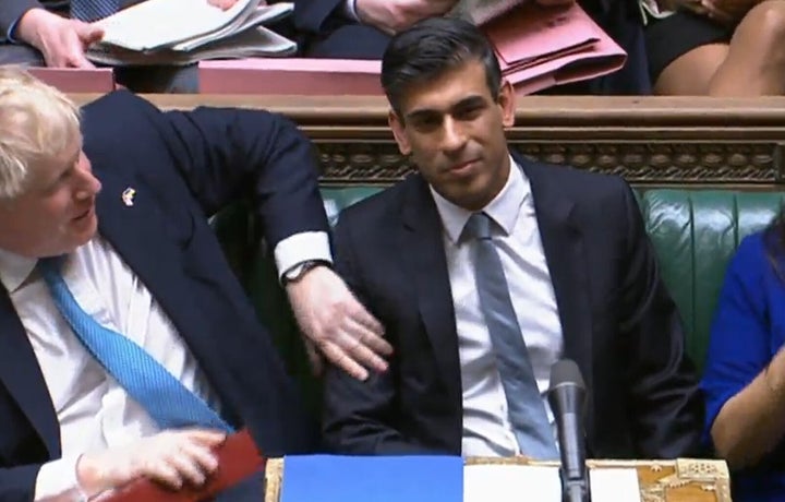 Rishi Sunak is congratulated by Boris Johnson after delivering his Spring Statement