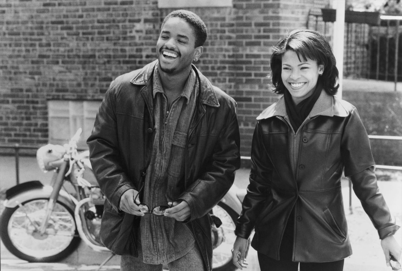 Larenz Tate and Nia Long on the set of the New Line Cinema movie " Love Jones," circa 1997.