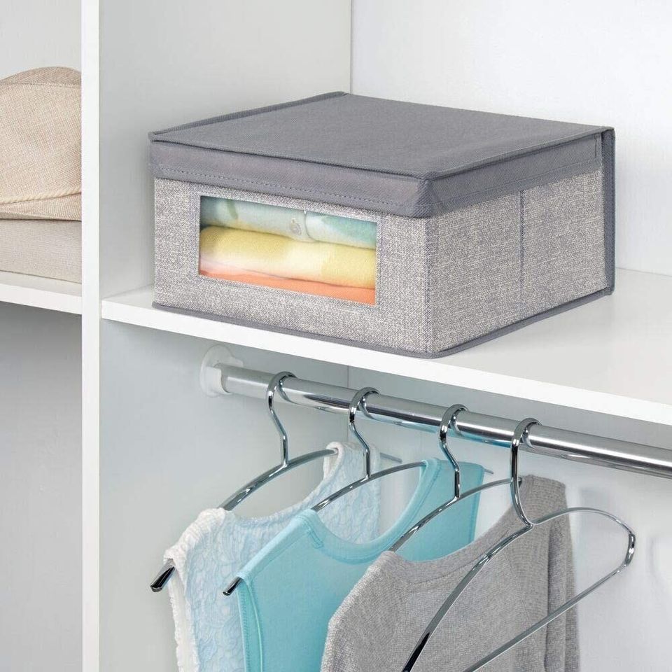 A set of storage boxes that neatly stack on top of each other.