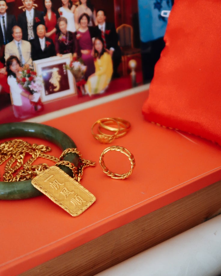 This gold ring has been passed down for four generations, during Chinese tea ceremonies. During the Cultural Revolution in China, objects of wealth were stripped away but the ring survived.