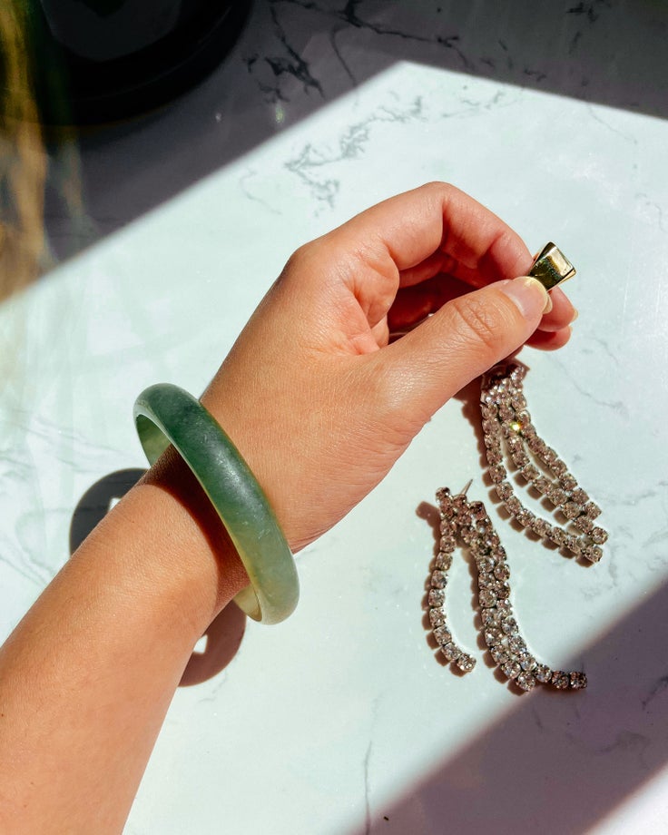 This jade bracelet was given to Melody by her grandmother, a self-made businesswoman who provided for her family by running a small store outside her home.