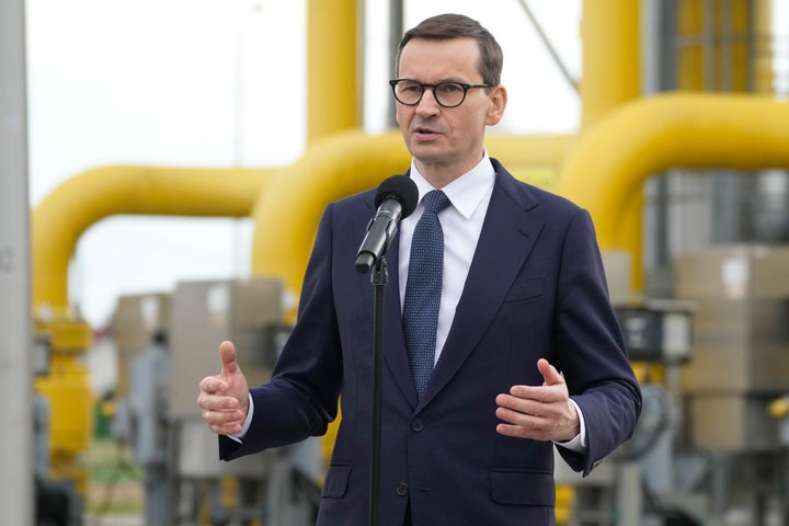 Poland's Prime Minister Mateusz Morawiecki speaks to media at the gas station of Gaz-System in Rembelszczyzna, near Warsaw, Poland, pm April 27, 2022.
