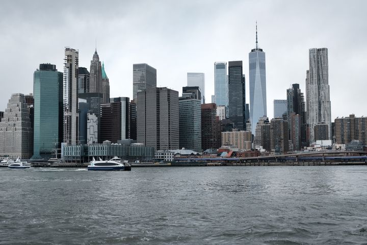 The Manhattan skyline looms over the East River on March 28, 2022 in New York City.