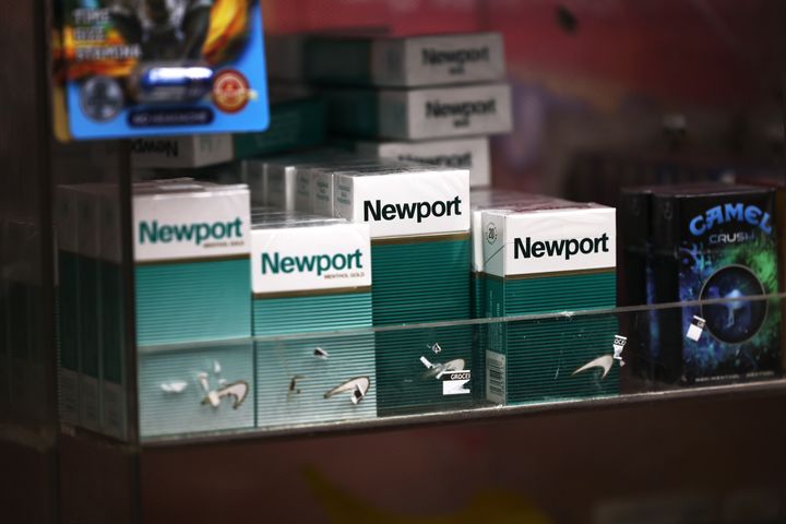 Packs of Newport cigarettes are seen on a shelf in a grocery store in the Flatbush neighborhood on April 29, 2021 in the Brooklyn borough of New York City. The Biden administration announced its plan to ban menthol cigarettes and flavored cigars citing the health reasons that disproportionately affect communities of color and low-income populations who are more likely to use the products.