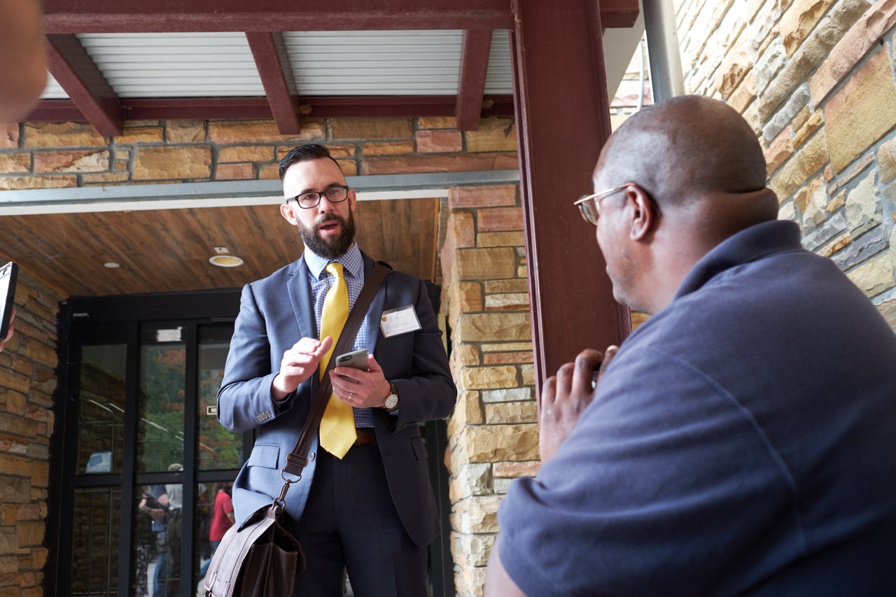 Evan McLaren (at left), seen here in 2017, says he now fully disavows the racist far-right movement of which he was once part.