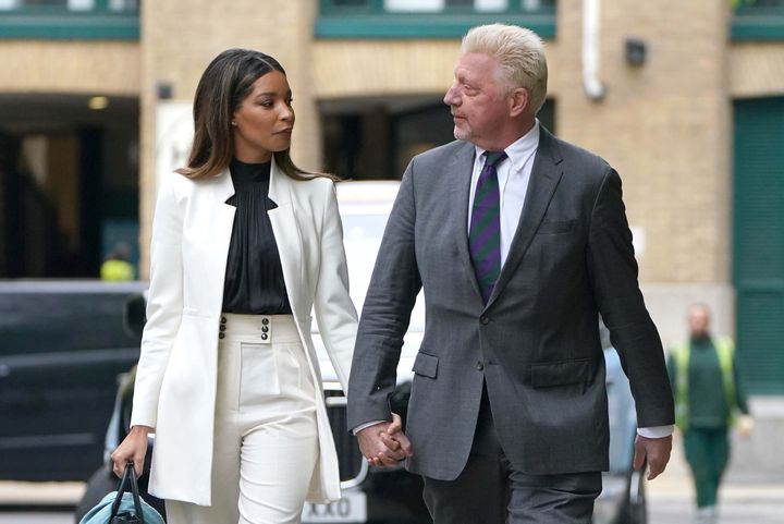 Boris Becker arrives alongside partner Lilian de Carvalho Monteiro, for sentencing at Southwark Crown Court, in London