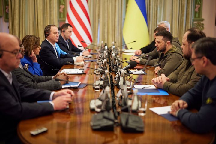 In this image released by the Ukrainian Presidential Press Office on Sunday, May 1, 2022, Ukrainian President Volodymyr Zelenskyy, third from right, and U.S. Speaker of the House Nancy Pelosi, third from left, talk during their meeting in Kyiv, Ukraine, Saturday, April 30, 2022. (Ukrainian Presidential Press Office via AP)