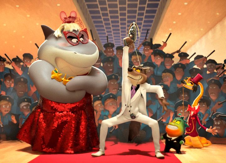 This image released by DreamWorks Animation shows animated characters, foreground from left, Shark, voiced by Craig Robinson, Wolf, voiced by Sam Rockwell, Piranha, voiced by Anthony Ramos and Snake, voiced by Marc Maron in "The Bad Guys." (DreamWorks Animation via AP)