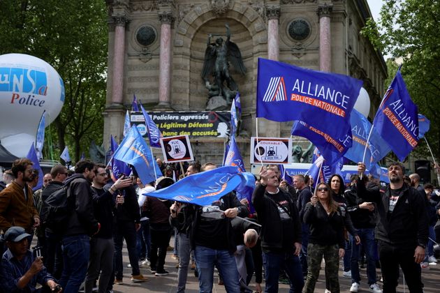 French police officers from the Alliance union gathered during a demonstration to defend...