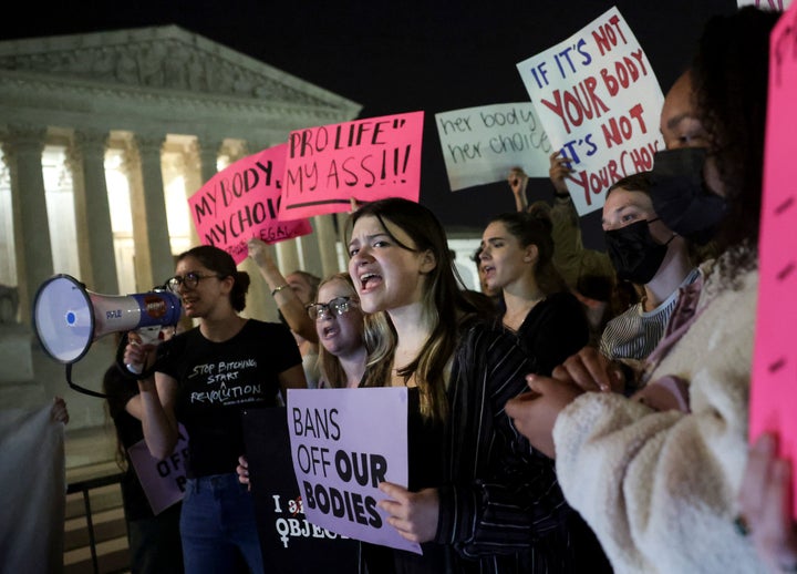 Demonstrators holding posters in support of abortion rights gather outside of the Supreme Court on May 2, 2022, in Washington, D.C.