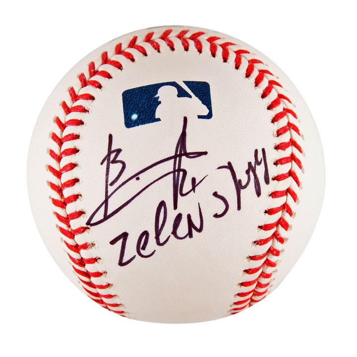 This image provided by RR Auction shows a baseball signed by Ukrainian President Volodymyr Zelenskyy. The official Rawlings Major League baseball is being sold by Randy Kaplan, the renowned collector of balls that have been signed by world leaders, with a portion of the proceeds going to war relief efforts in Ukraine, auctioneer RR Auction of Boston said Tuesday, May 3, 2022. (RR Auction via AP)