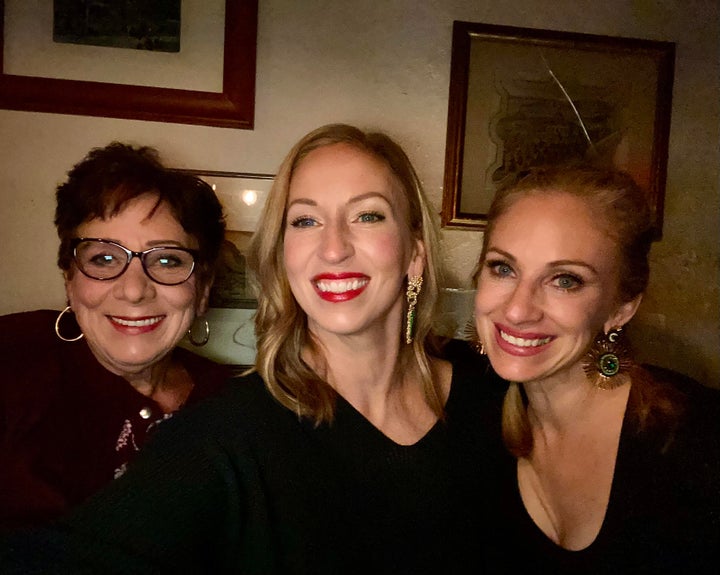 The author (center) with her mom and sister at dinner in Denver, about a year and a half after her mom left rehab.