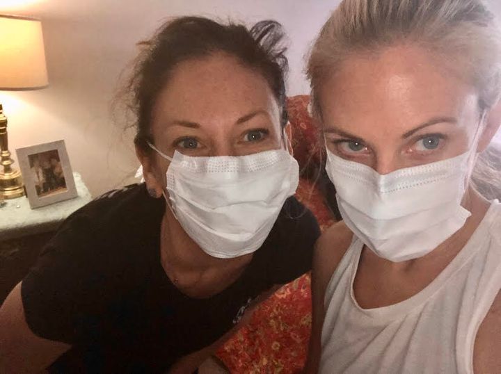 The author (left) and her sister Jessie on the day they cleaned out their mom's apartment while she was in rehab. "This was before masks were the norm," she notes.