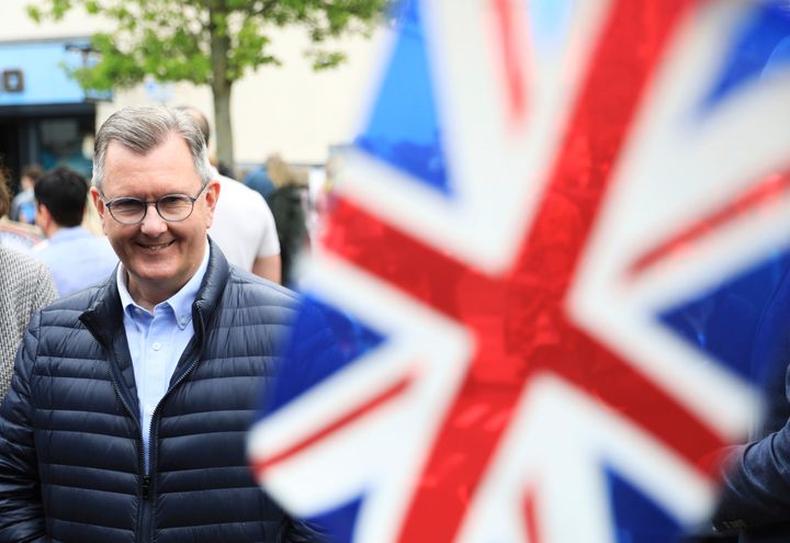 Jeffrey Donaldson, leader of the Democratic Unionist Party, smiles while out canvassing in Holywood on the outskirts of Belfast, Northern Ireland.