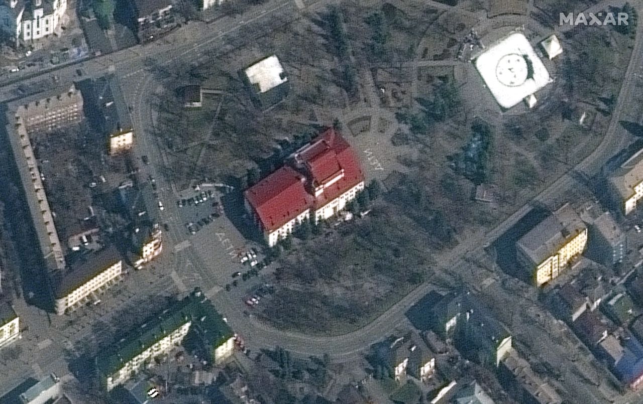 In this satellite imagery from March 14, the word "children" is written in large white letters (in Russian) in front of and behind the theater. 