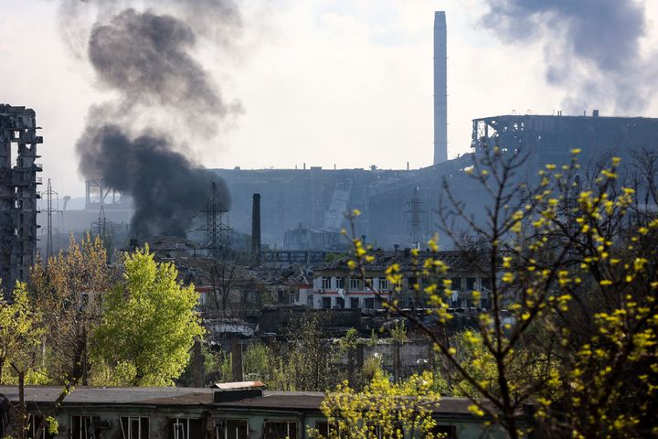 Smoke rises from the Metallurgical Combine Azovstal in Mariupol, in territory under the government of the Donetsk People's Republic, eastern Ukraine, on May 4, 2022. 