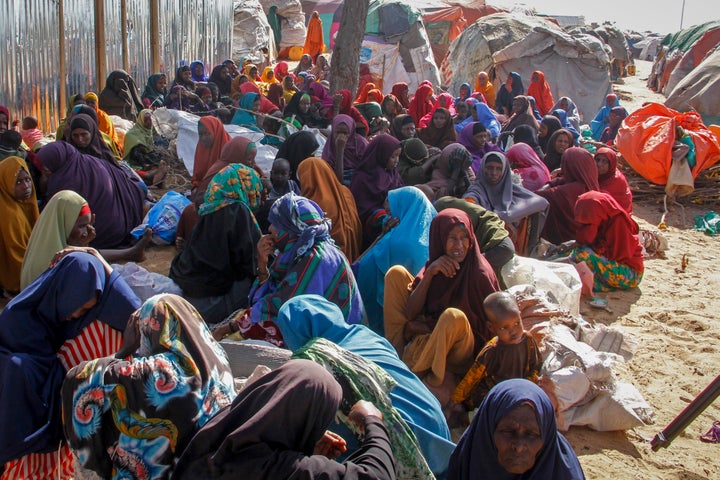 Somalis who fled drought-stricken areas sit at a makeshift camp on the outskirts of the capital Mogadishu, Somalia on Feb. 4, 2022.