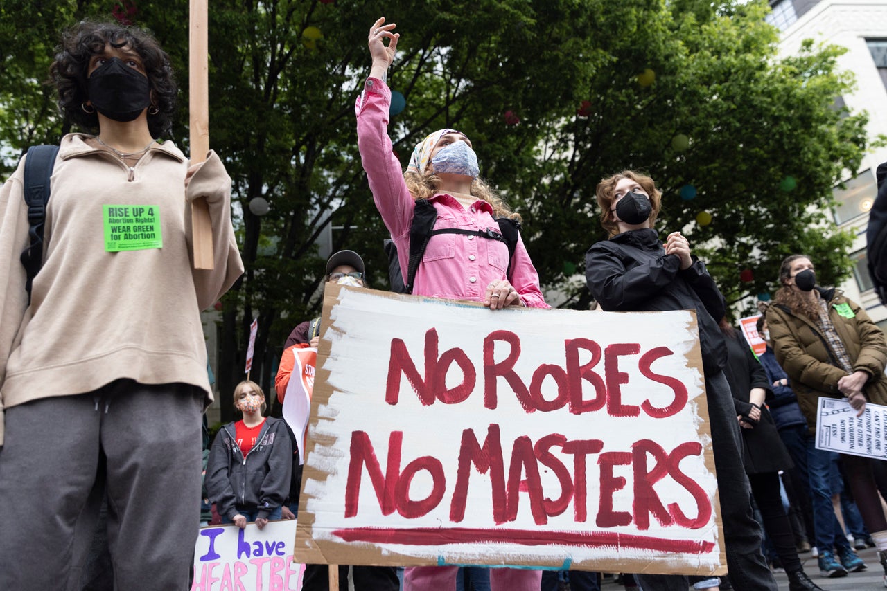 Reproductive rights advocates rallied in protest of Alito's draft opinion overturning Roe v. Wade with allusions to slavery.