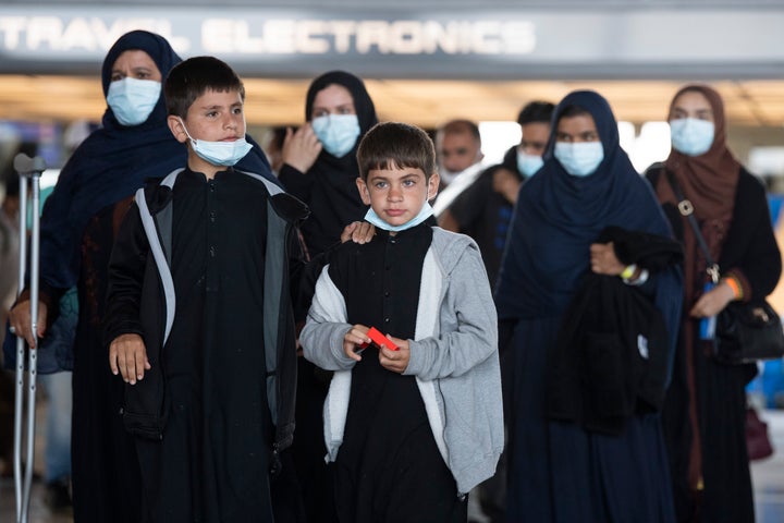 Afghan Migrants Face Serious Conflict Without Congress'S Help Afghan Refugees Arrive At Dulles International Airport On August 27, 2021, After Afghanistan Fell To The Taliban.