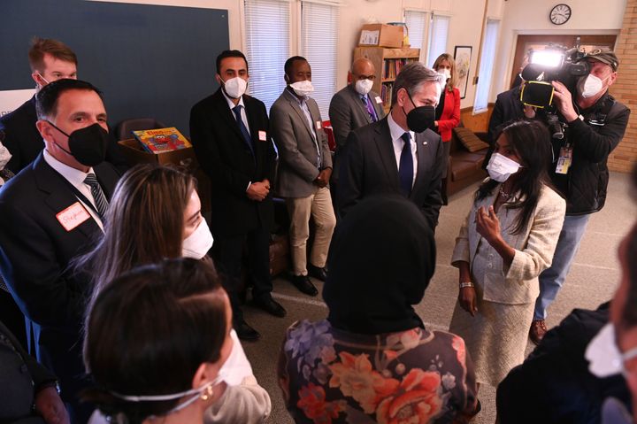 Secretary of State Antony Blinken meets with recently resettled Afghans and with staff members and volunteers from local refugee resettlement agencies at the Lutheran Immigration and Refugee Service in Alexandria, Virginia, on Dec. 20, 2021.