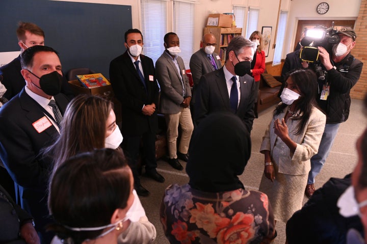 Secretary of State Antony Blinken meets with recently resettled Afghans and with staff members and volunteers from local refugee resettlement agencies at the Lutheran Immigration and Refugee Service in Alexandria, Virginia, on Dec. 20, 2021.