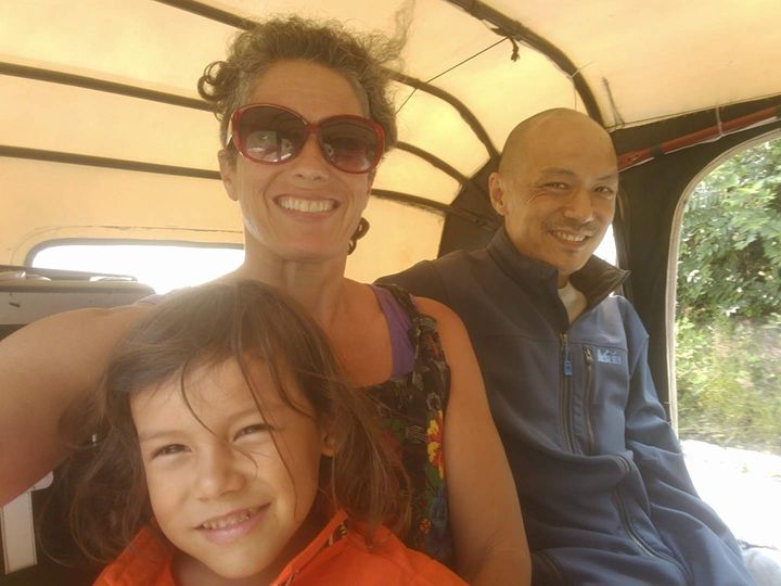 The author's family in a tuk tuk in Guatemala. "I’ve done my best to prioritize my and my son’s mental health amid environmental calamity and worldwide chaos," she writes.