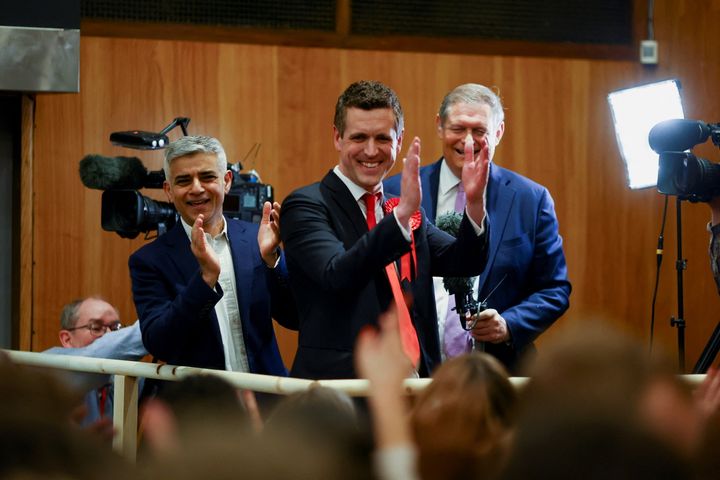 London mayor Sadiq Khan and new leader of Wandsworth Council Simon Hogg celebrate after the Labour gain of Wandsworth council during local elections.