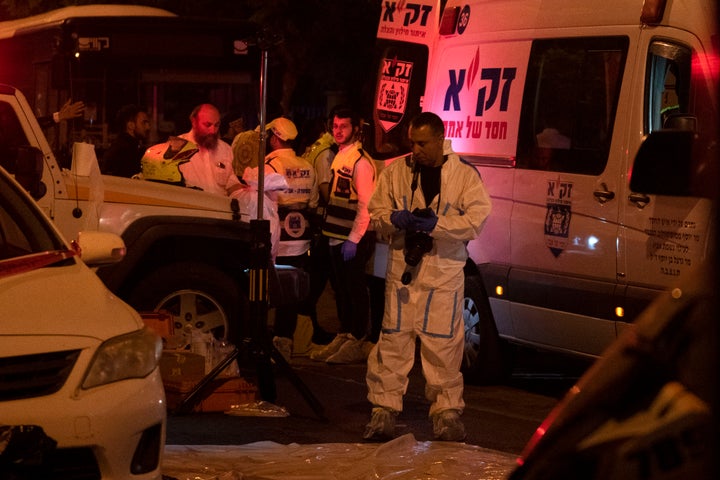 An Israeli police officer is investigating the scene of the attack on the Israeli city of Greece on May 5, 2022.