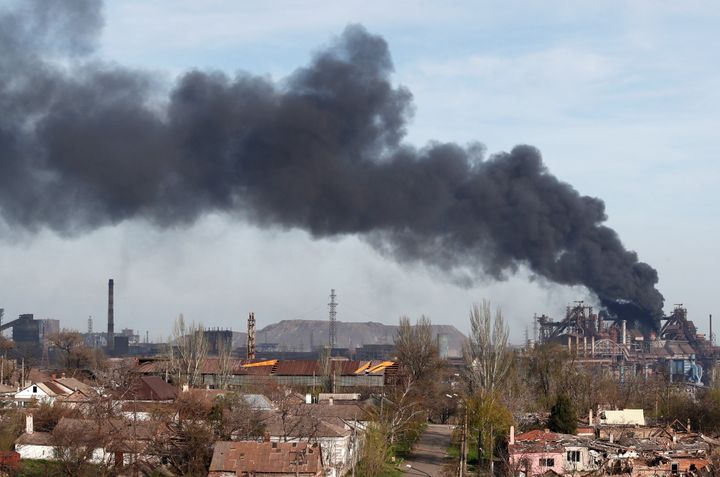 Smoke rises above a plant of Azovstal Iron and Steel Works during Ukraine-Russia conflict in the southern port city of Mariupol, Ukraine April 25, 2022. 