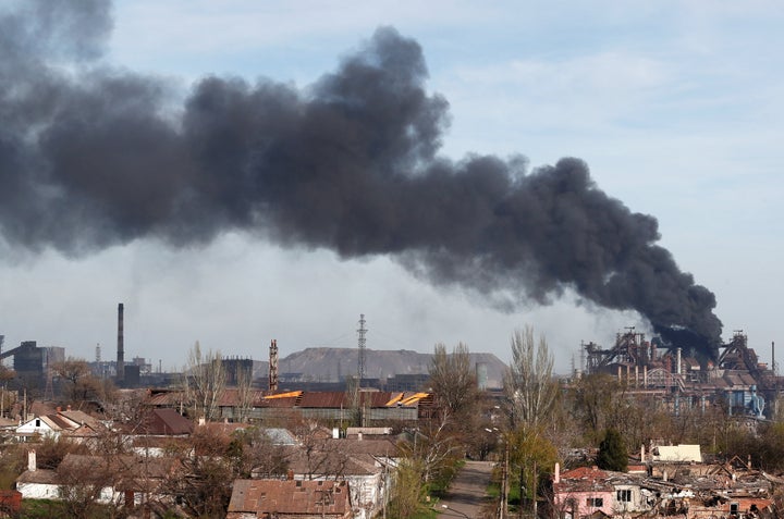 Smoke rises above a plant of Azovstal Iron and Steel Works during Ukraine-Russia conflict in the southern port city of Mariupol, Ukraine April 25, 2022. 