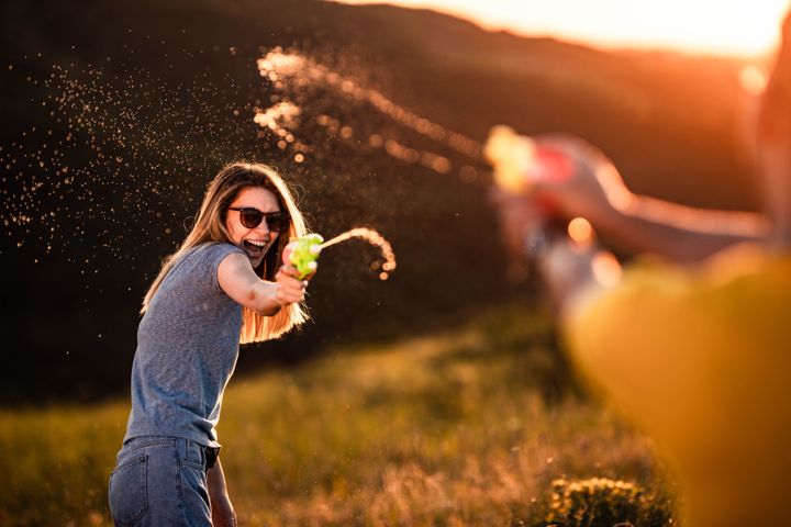 Grab a water gun, grab some friends and head to an open space.
