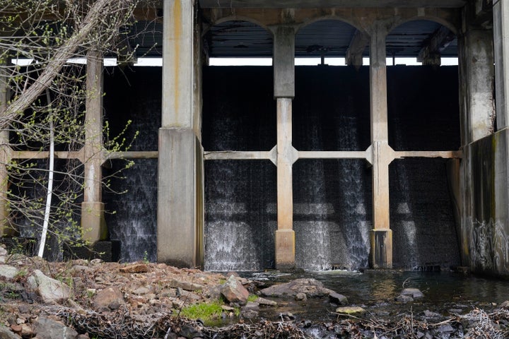 Water flows over the Lake Sebago Dam in Harriman State Park near Sloatsberg, N.Y., Tuesday, May 3, 2022.