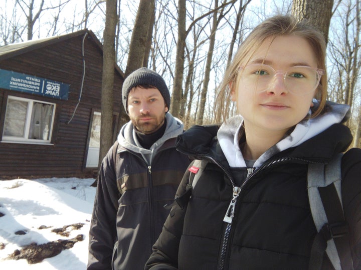 This March 2022 photo provided by Alona Shulenko shows her, right, and fellow zoologist Anton Vlaschenko outside the Feldman Ecopark area outpost of the Ukrainian Bat Rehabilitation Center in Kharkiv, Ukraine. 